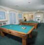 Windsor Palms Resort gamesroom with billiard tables inside the Clubhouse - Condo rental home in kissimmee orlando florida